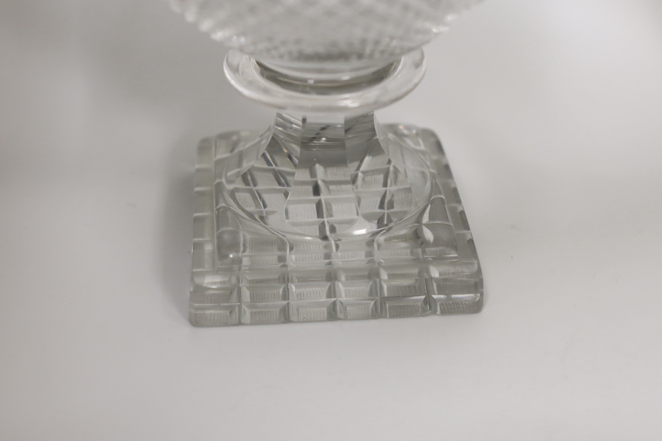 A pair of Georgian cut glass turnover rim pedestal dishes, 22cm tall